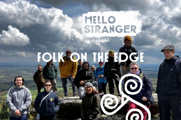 Group of walkers taking part in Folk on the Edge. Part of Wildworks' WE ARE SHINING project.