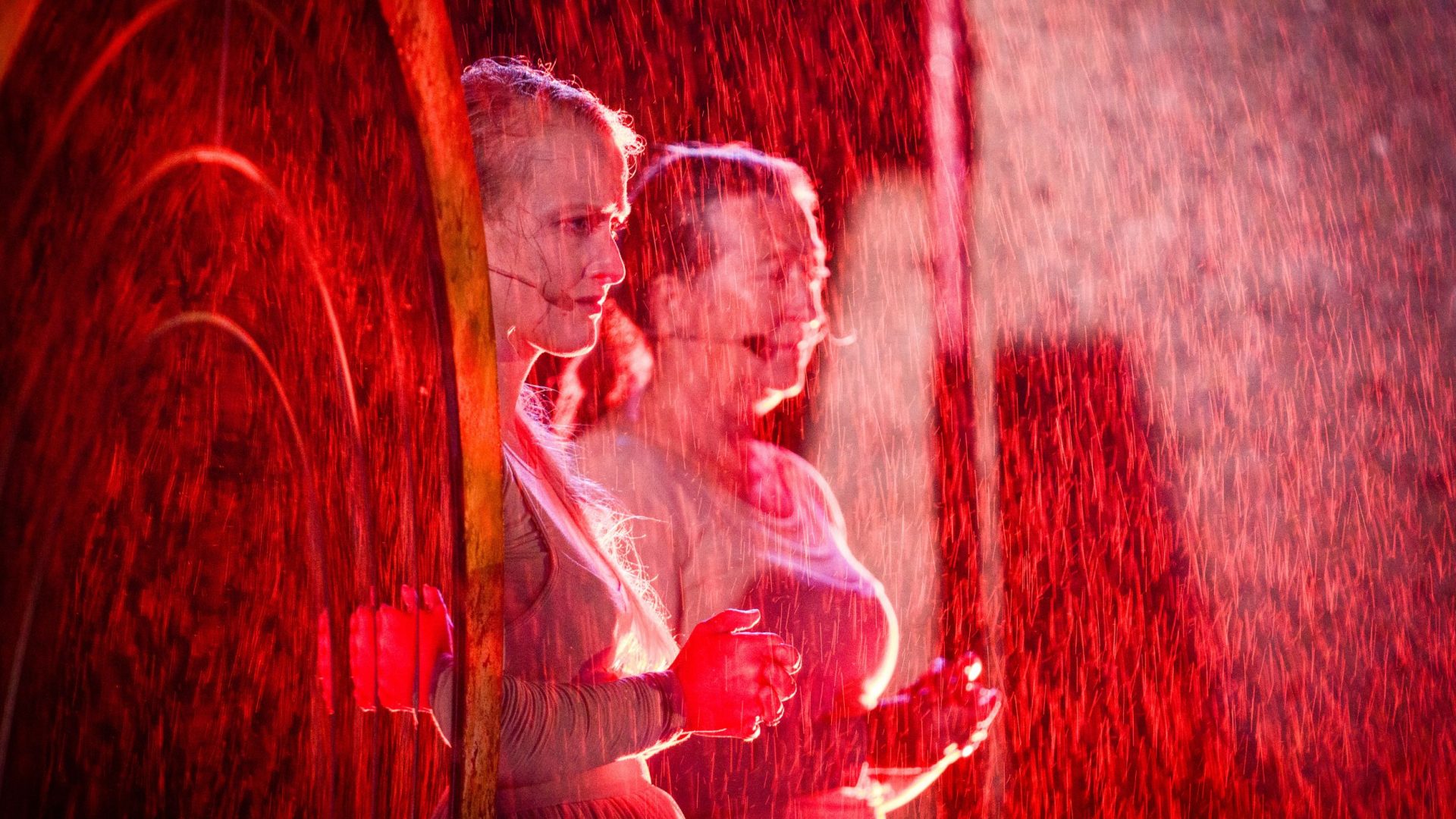 Performers in the rain - Stranger Beasts by Wildworks