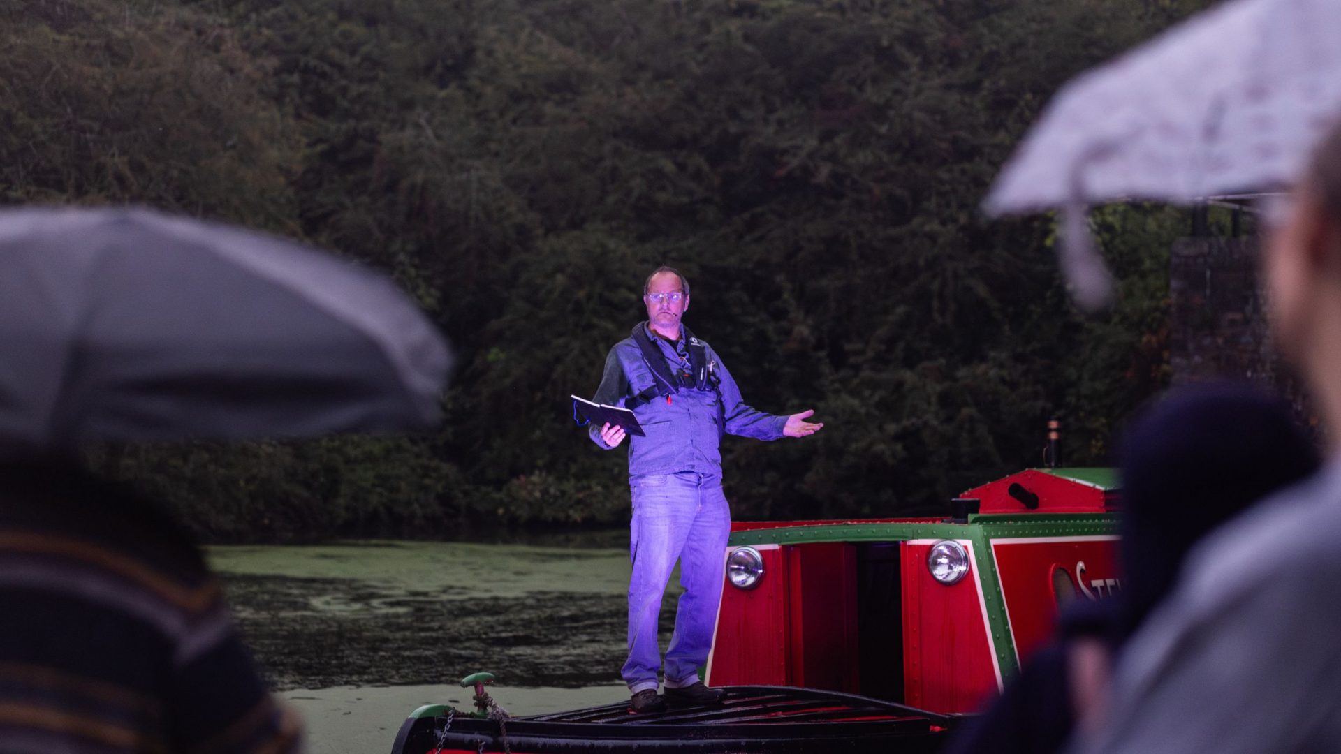 The Phoenix Project, Brierley Hill. A man performs a poem onboard a canal boat