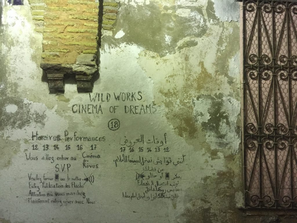 Show times written on the wall. Cinema of Dreams by Wildworks