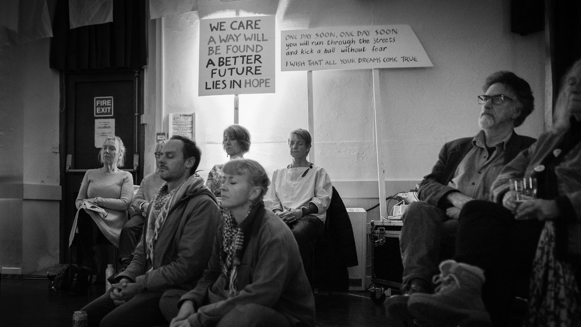 Audience members watch on during From West Cornwall to the West Bank by Wildworks.