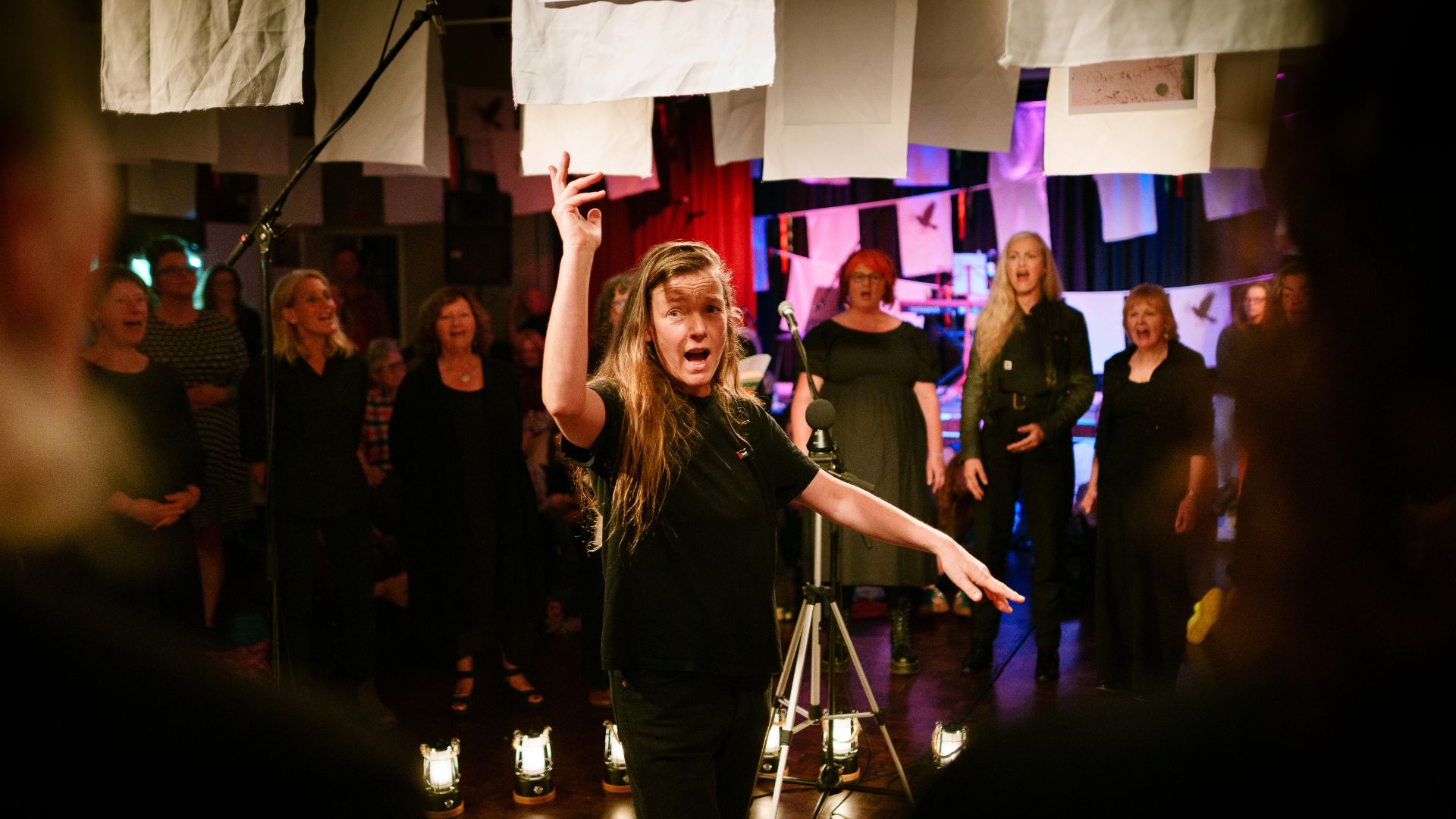 Julia Macara with Blend Choir during From West Cornwall to the West Bank by Wildworks.